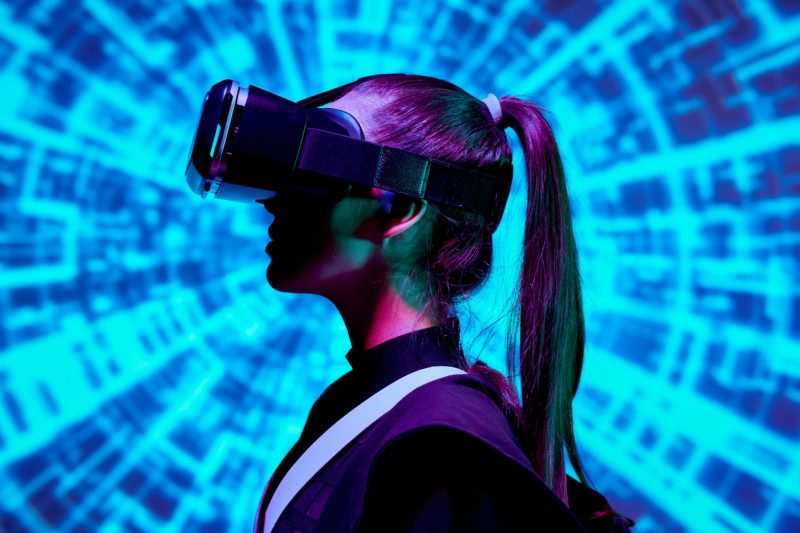 Female gamer in VR device